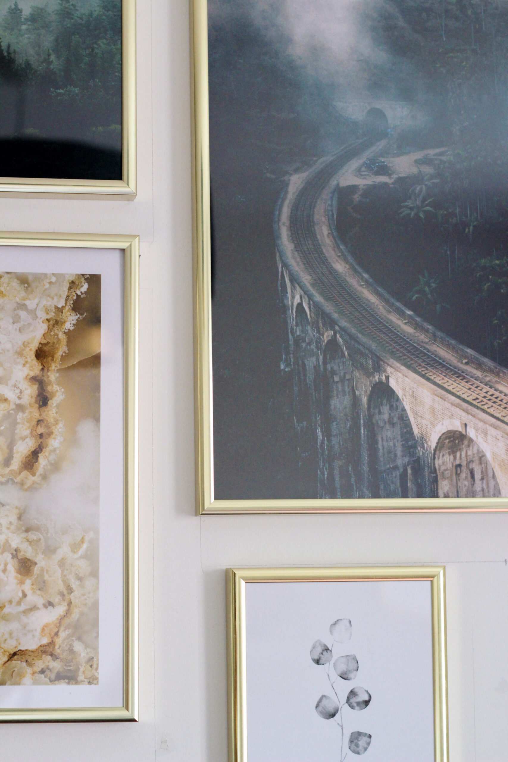 Posters of a viaduct, golden abstract waves and a simple flower